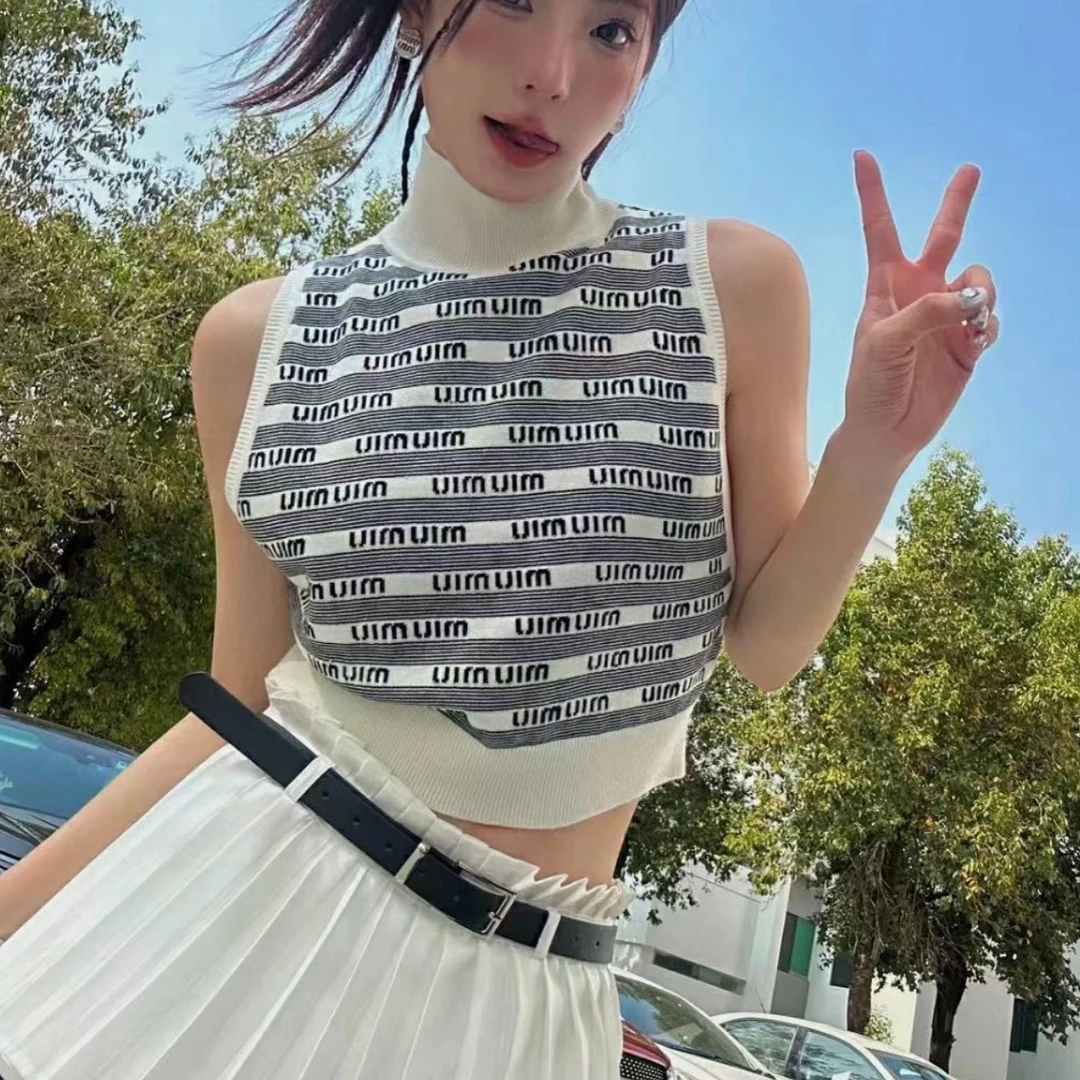 99新 MIU MIU/缪缪 条纹羊绒背心36码