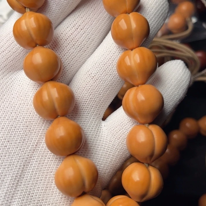 戏***生猴头核桃手串屁桃