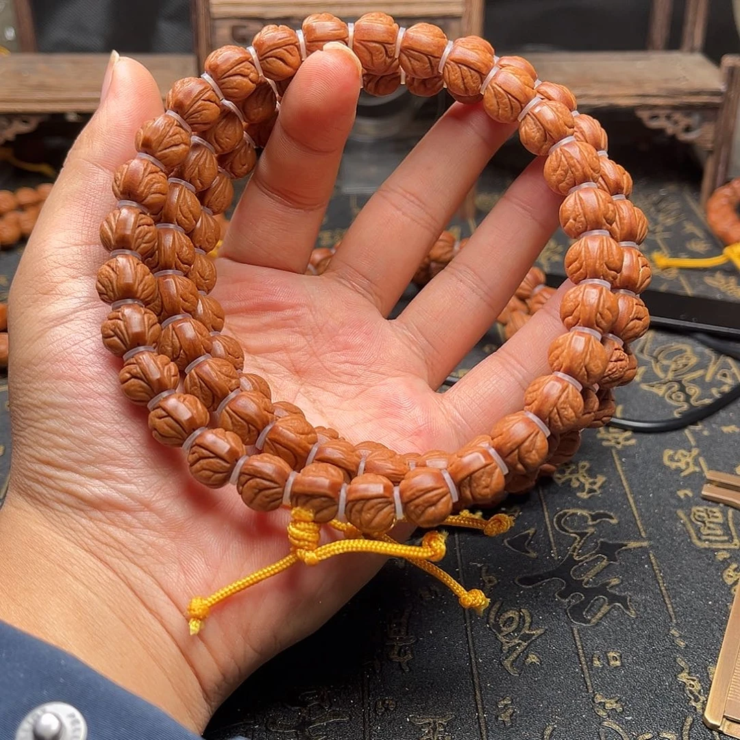 桃核吊坠小龙纹手持