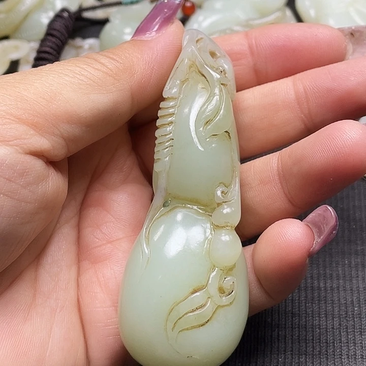 孟***装和田玉未镶嵌把件
