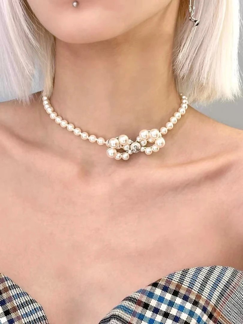 钛钢仿珍珠项链 新款西家珍珠结土星项链轻奢甜美气质星球锁骨链