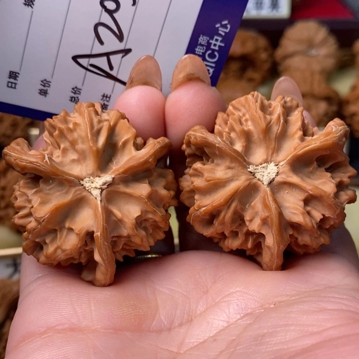 那***吧把件桃核精品大三棱