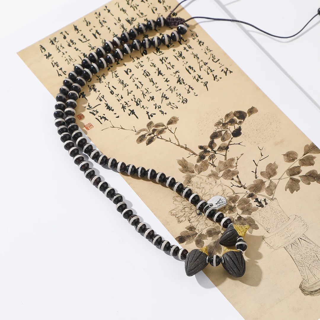 一了个卜一线药师娘拉项链
