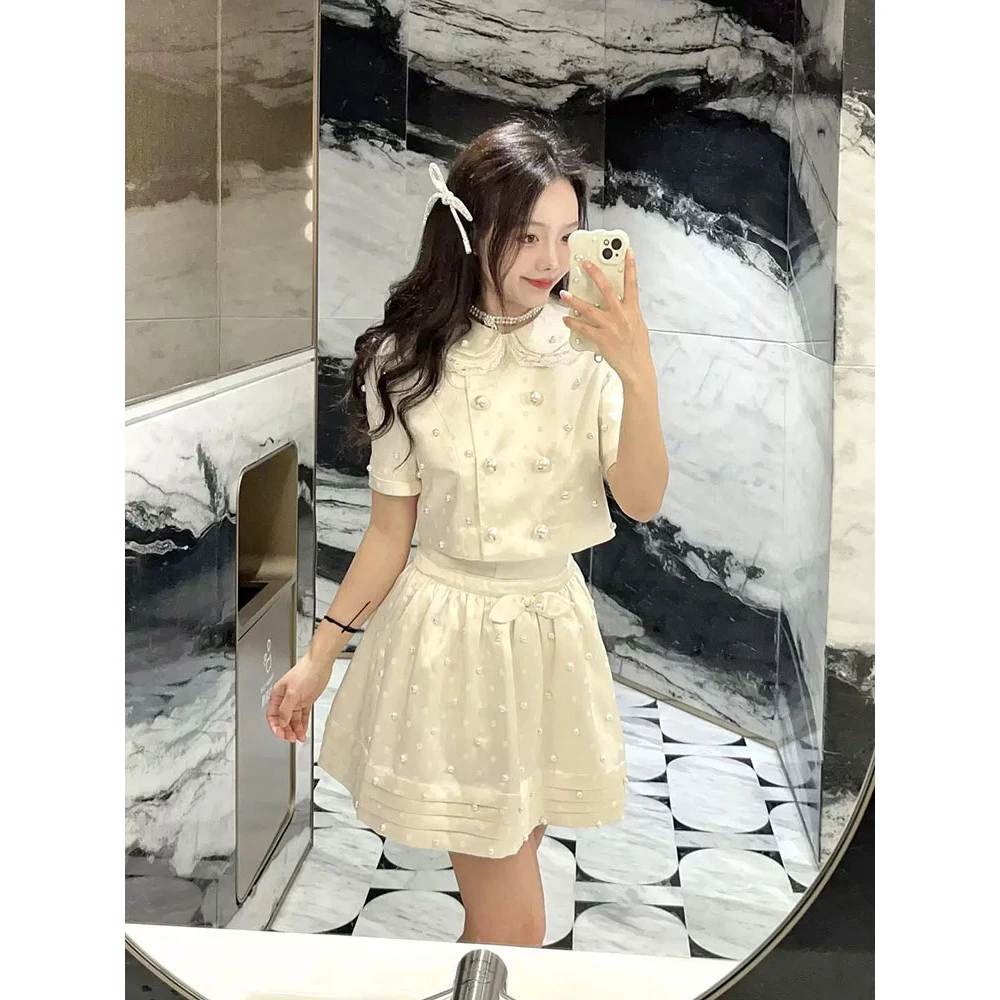 【DÉ MYSTÈRE】富家千金钉珠娃娃领提花上衣/蓬蓬半裙套装GZJ68166