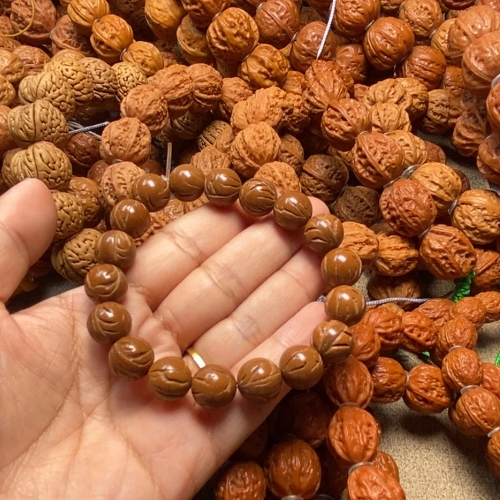 文玩核桃吊坠桃核光珠