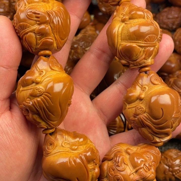 橄榄核吊坠鸡****练橄榄核手持