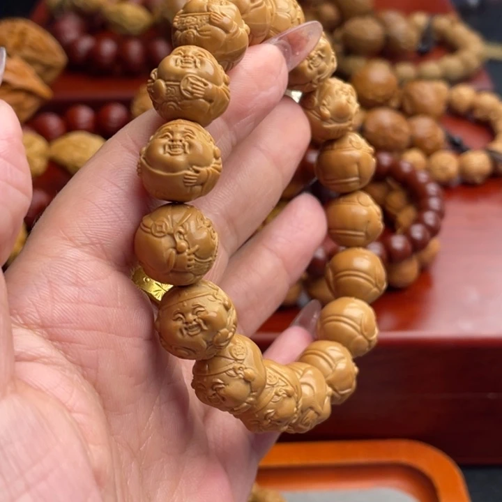 橄榄核吊坠猴头手串