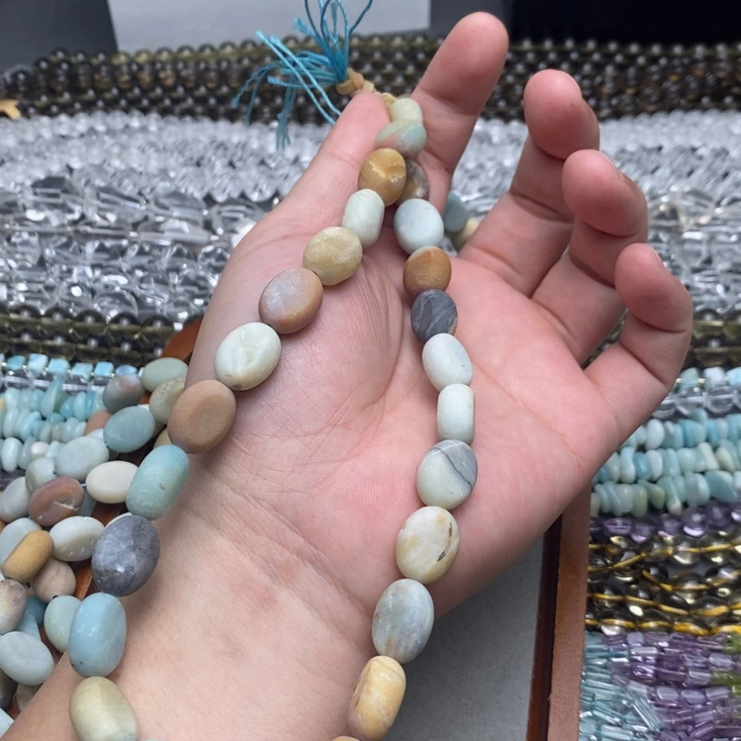 玛瑙/玉髓未镶嵌珠宝半成品亚马逊天河圆饼12*15mm一条