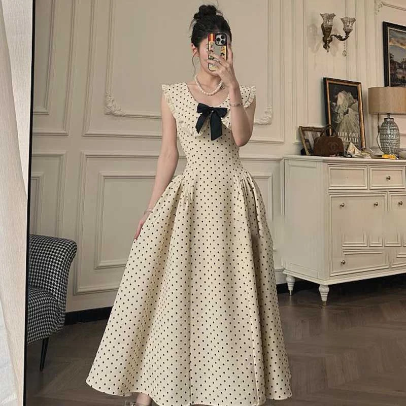 绝美蝴蝶结气质波点显瘦法式韩版小众收腰捏褶长款连衣裙D0773