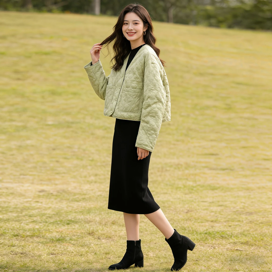 时尚气质V领单排扣白鸭绒羽绒服宽松休闲外套女保暖上衣2025年冬