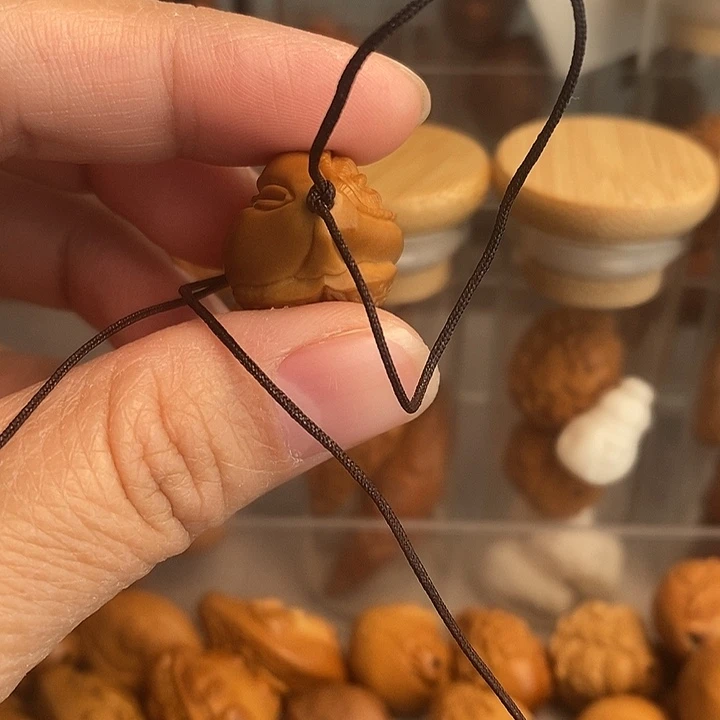 吊坠橄榄核生命，三面