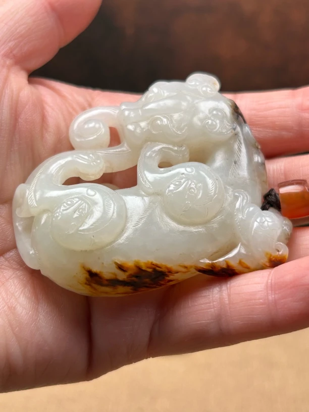 和田玉手把件玉兽