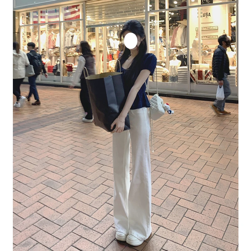 美式白色微喇牛仔裤女秋季2025新款高腰直筒显瘦梧桐阔腿拖地裤子