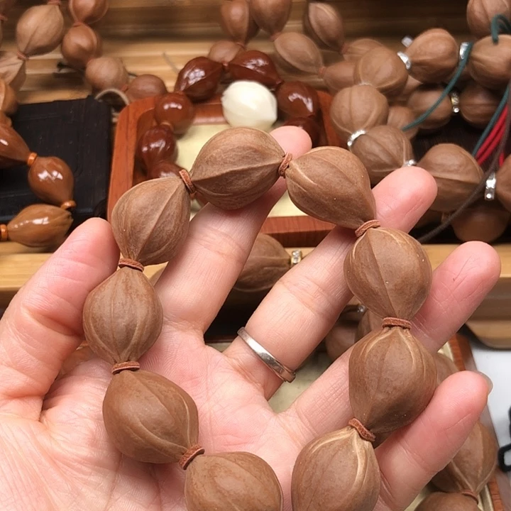 橄榄核手串梅林铁核19 X25四花