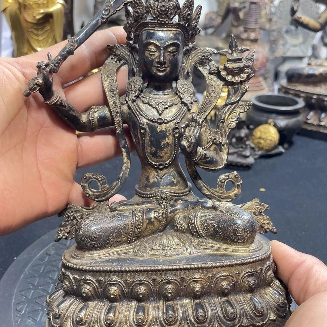 举剑文殊。                 299