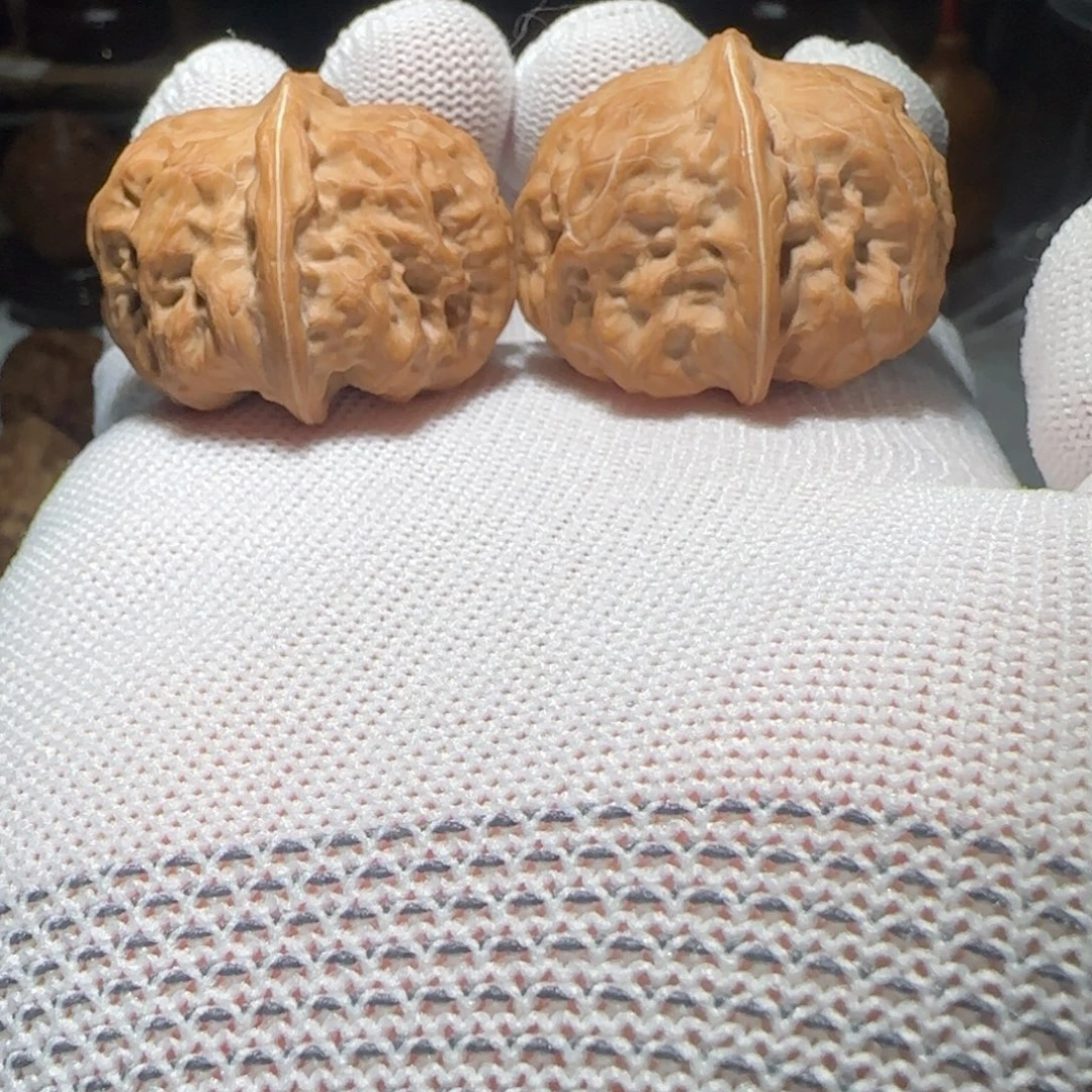 文玩核桃吊坠延庆元宝