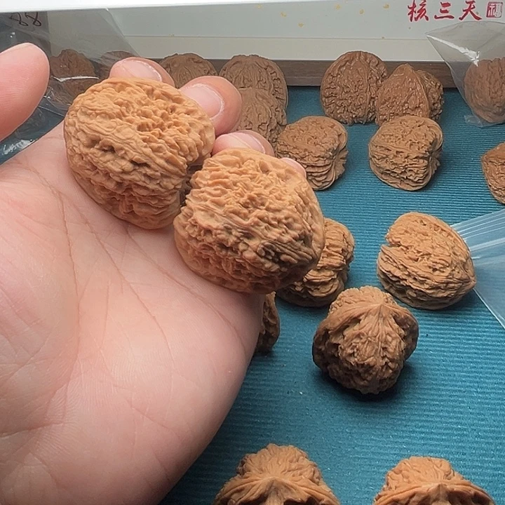 种***花吊坠文玩核桃55南疆石文玩核桃