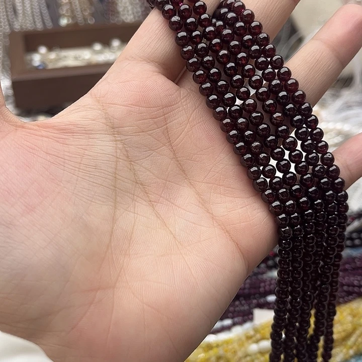 玛瑙/玉髓未镶嵌珠宝半成品一条5mm左右酒红石榴石