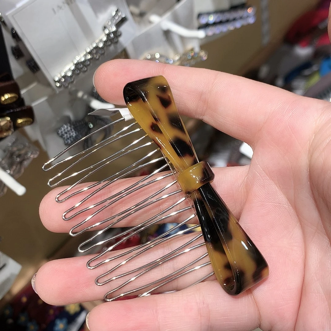 布艺非金属蝴蝶结豹纹插梳