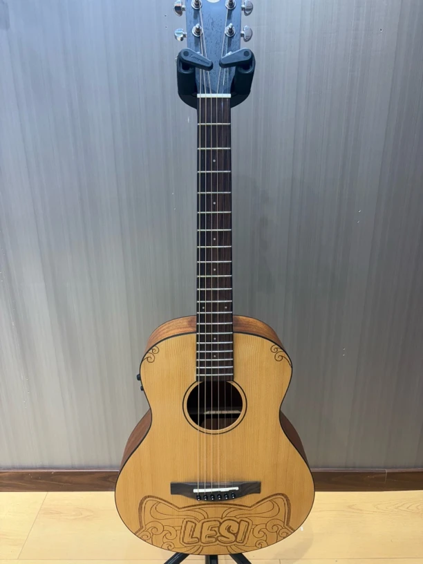 谦梦34寸桃花心单板吉他面单初学者小朋友旅行琴工厂直销