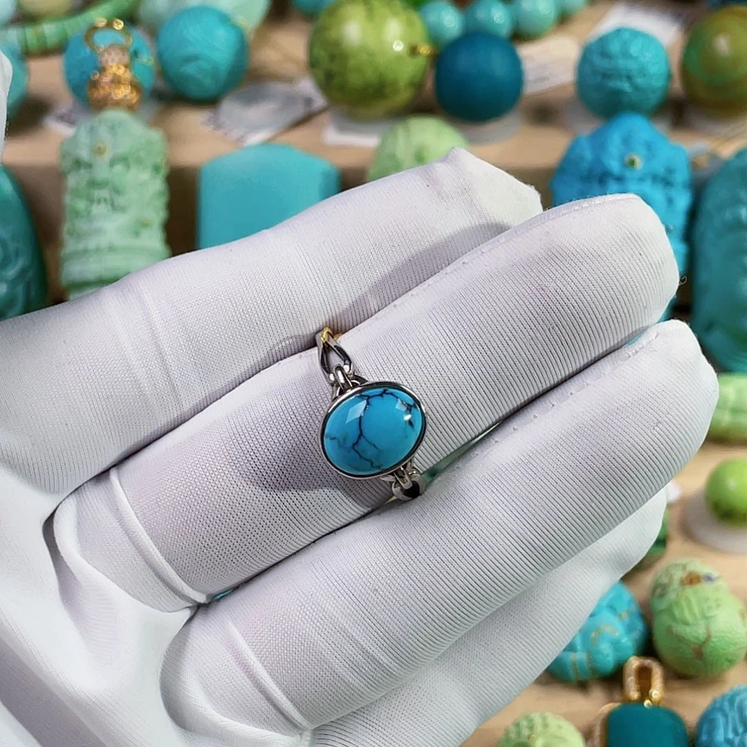 刘***梗绿松石银S925镶嵌珠宝奇石