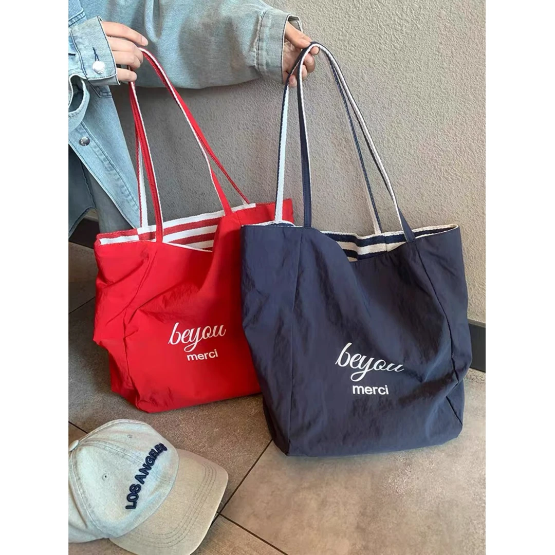 2025新款双面条纹帆布包小众字母大容量包包慵懒风单肩托特包