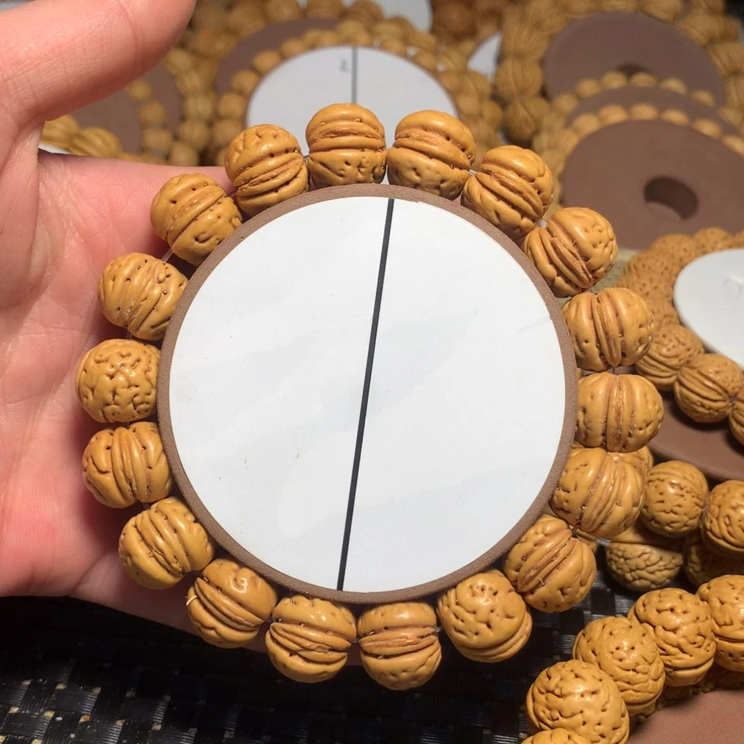 桃核手串查**朗高山奶豆