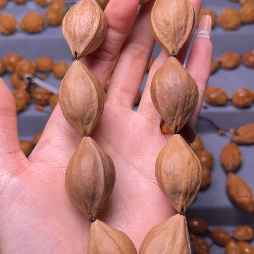 橄榄核吊坠2.1素核手持