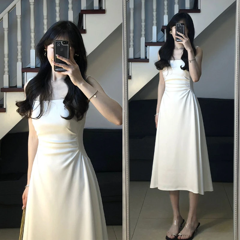 白色气质吊带连衣裙女夏新款法式夏日独特漂亮掐腰无袖背心长裙子