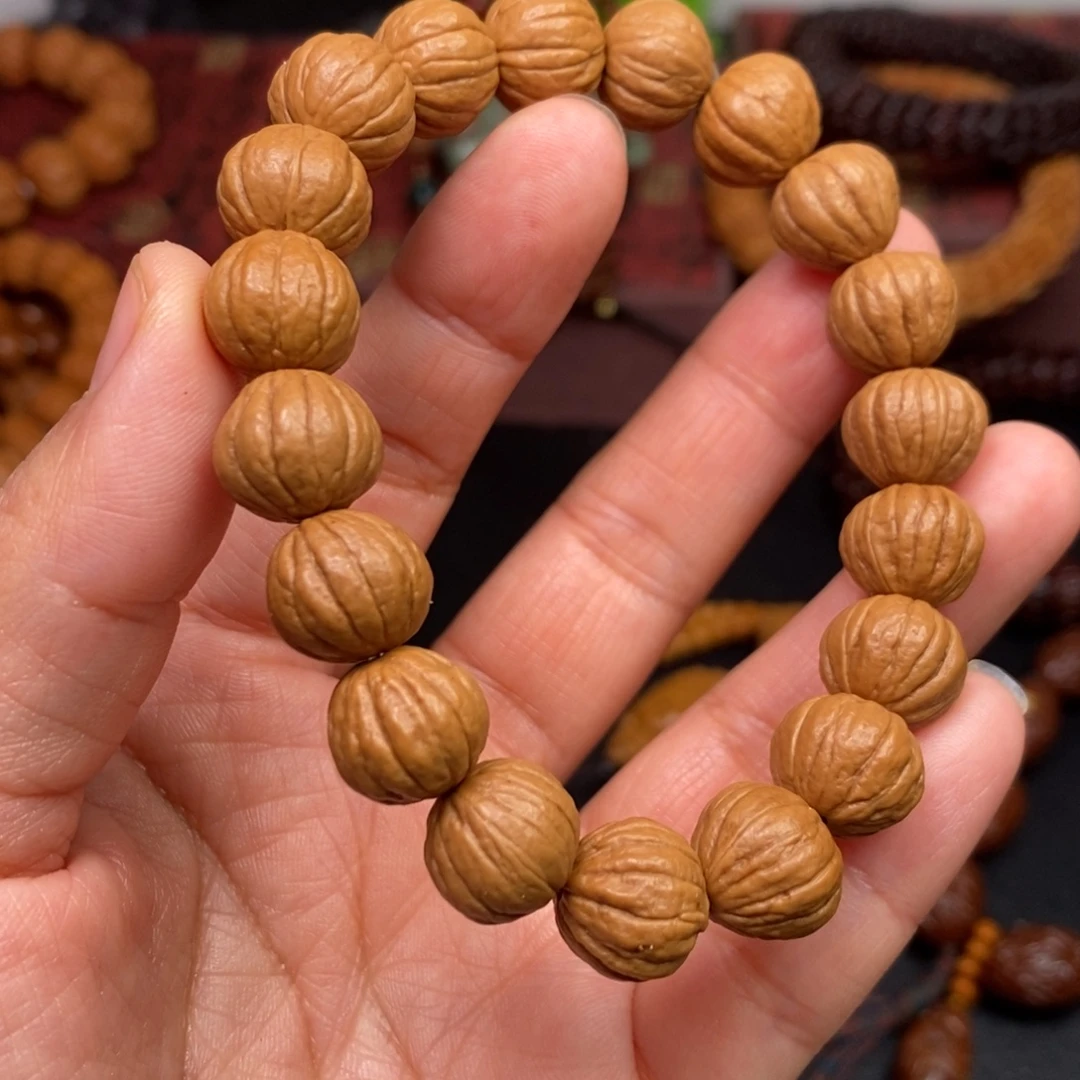 丁***丁吊坠猴头核桃橄榄猴头