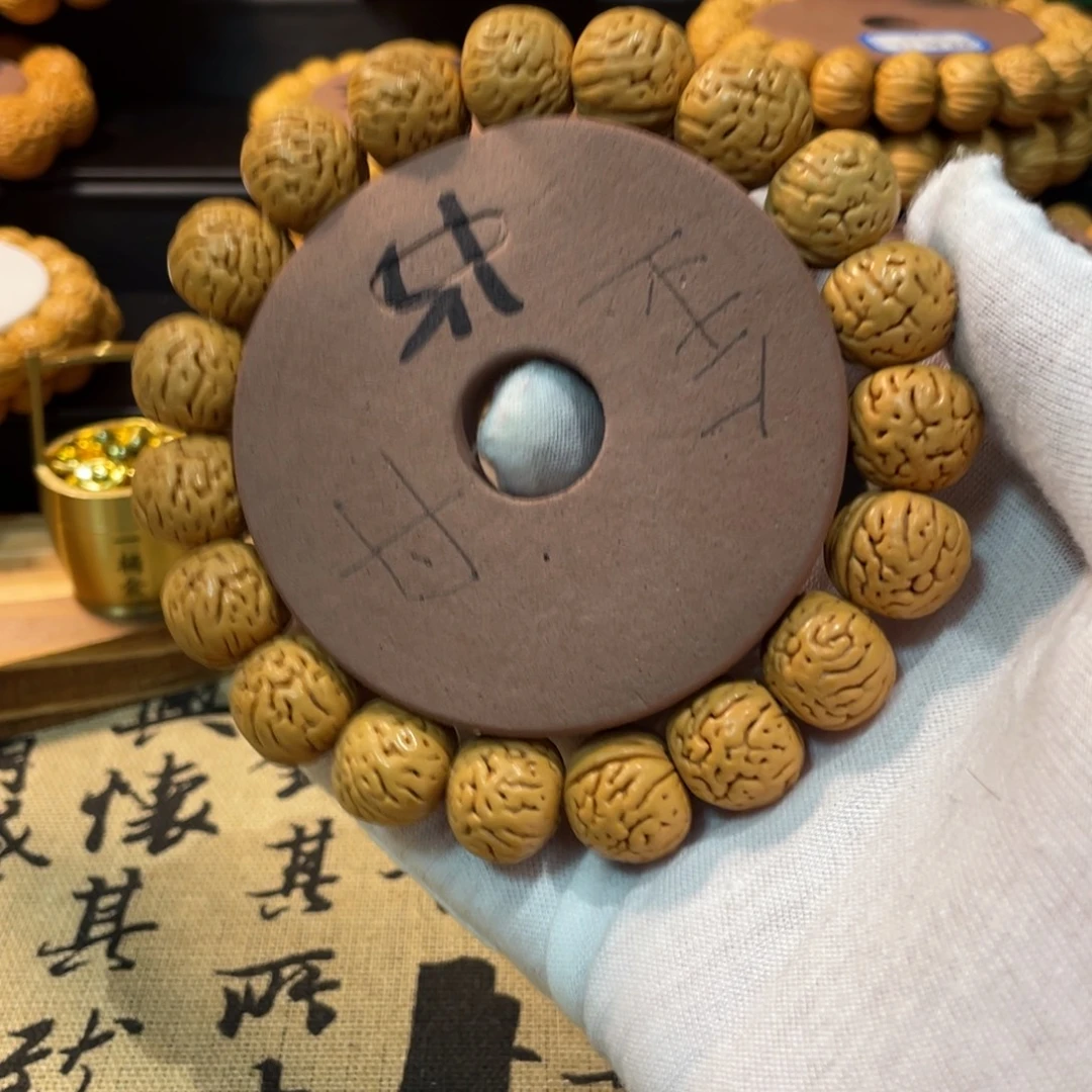 钱***海桃核手串金丹手串