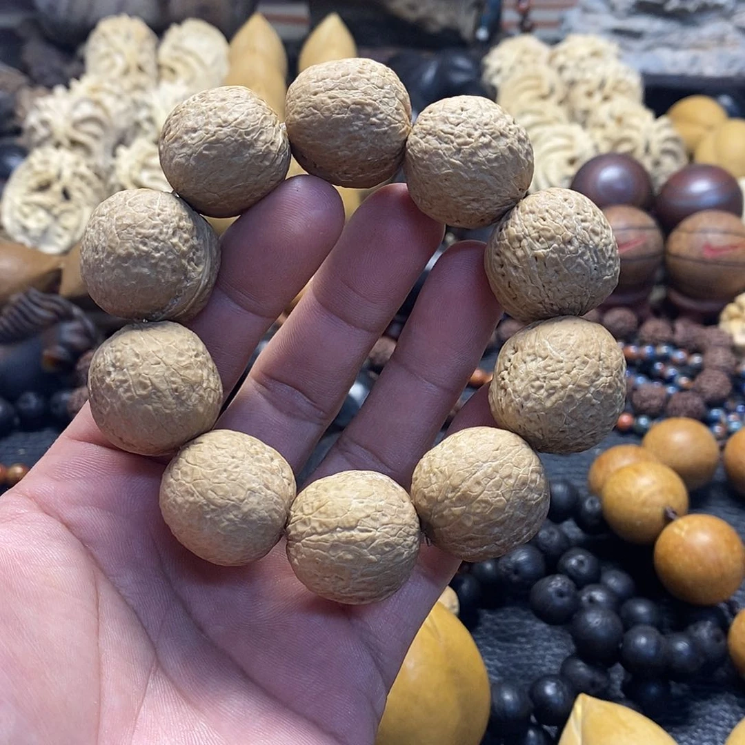 吊坠橄榄核鱼子纹铁核桃手串