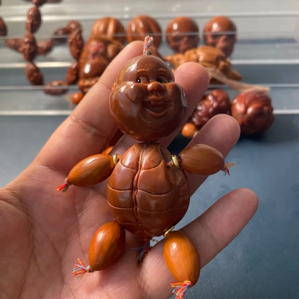巴西橄榄核雕刻文玩龟仙人富贵人生小人