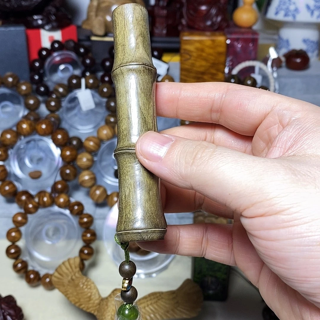 阴沉木玻璃底竹节手把件