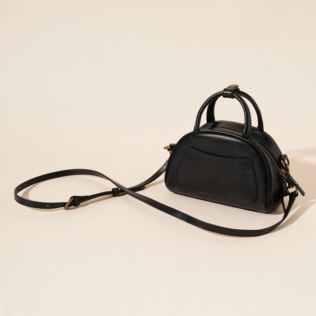 岩牛2025夏季新款时尚轻奢百搭简约斜挎手提女包YN3563