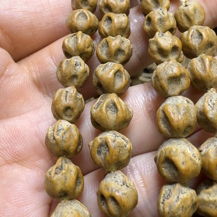 爱***卷吊坠柏香籽/百香籽原桩黄油皮独眼龙