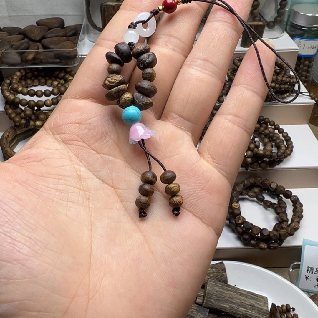 沉香碎屑沉香奇楠沉香手机绳子