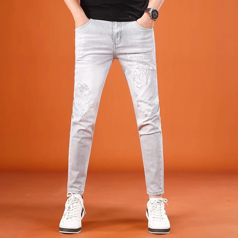 轻奢烫钻印花牛仔裤男款爆款2025新款夏季薄款修身小脚弹力九分裤
