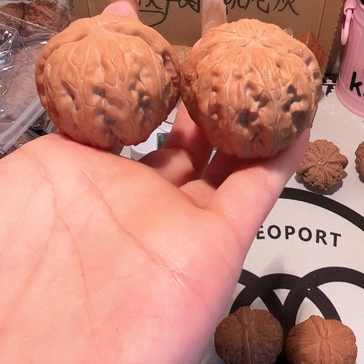 桃核吊坠会**?平谷元宝