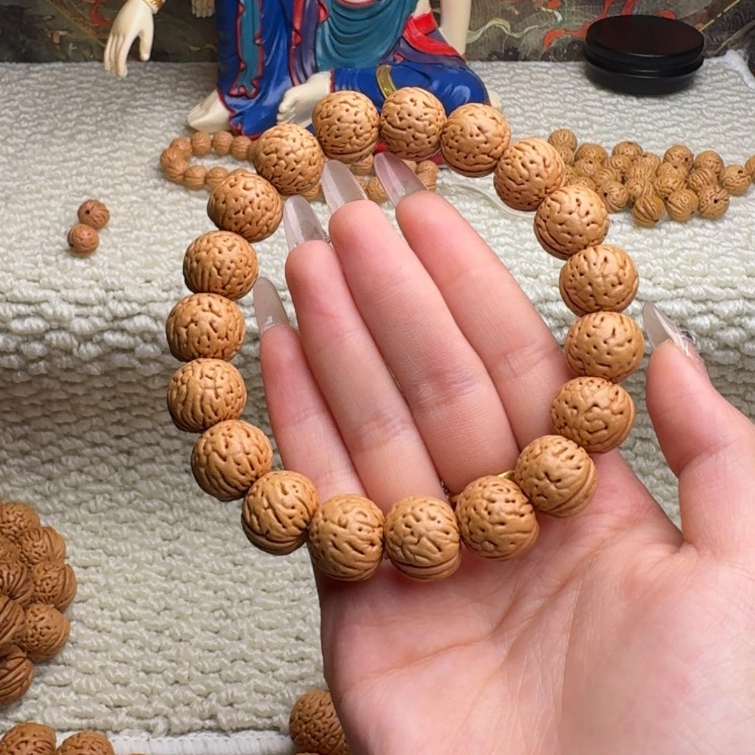 月***落桃核吊坠金丹手串