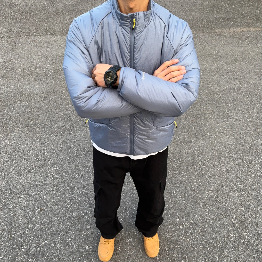 UNCLEBLUE 3M新雪丽防泼水运动棉服25冬季新品立领纯色防风外套男