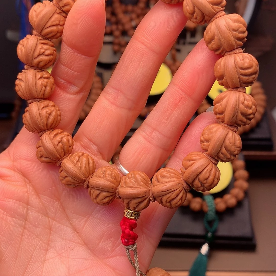 桃核手串董**选野生红莲15