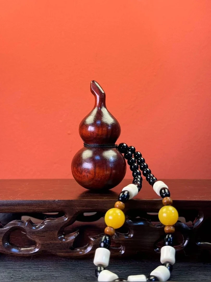 光面包浆葫芦檀木手把件