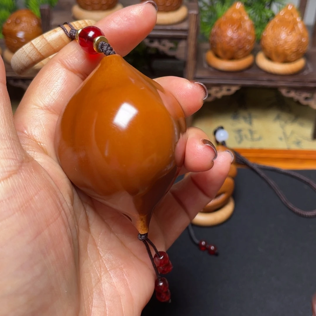 橄榄核吊坠蝴蝶47穿配