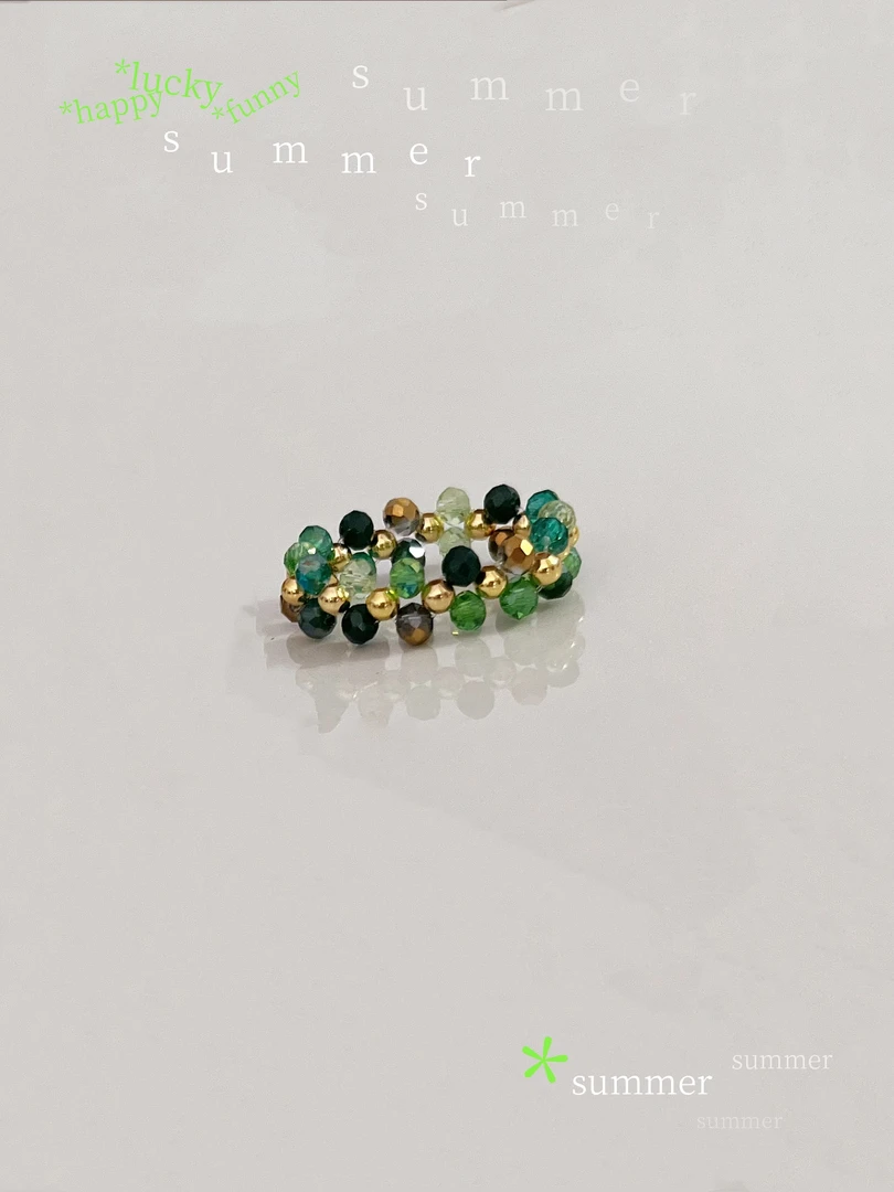 钛钢仿水晶戒指 4143钛钢夏日清凉小绿米珠串珠戒指