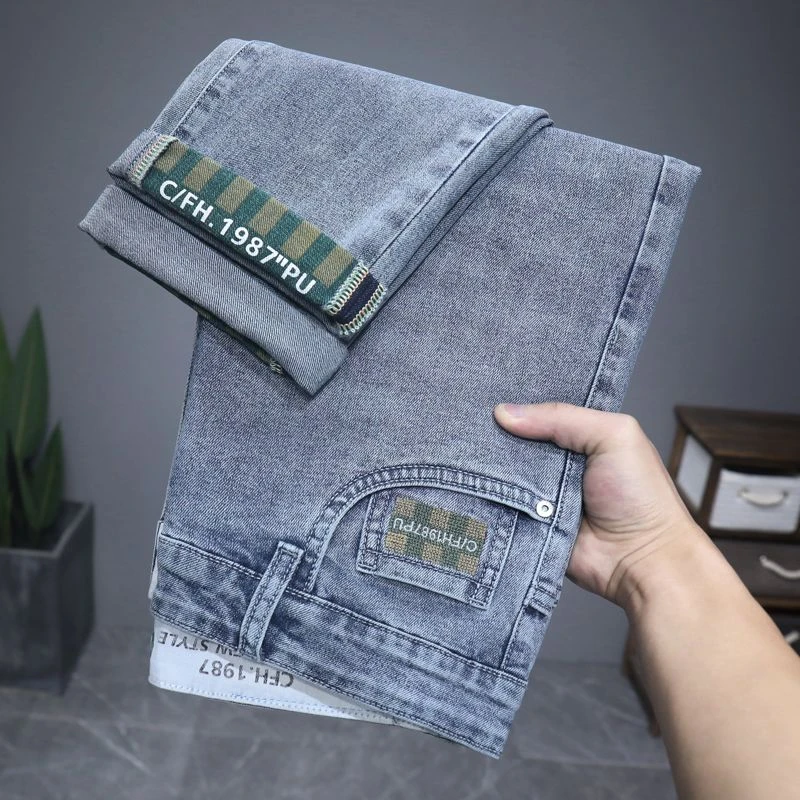 春季款高端刺绣牛仔裤男款弹力休闲微阔小直筒长裤潮流百搭裤子男