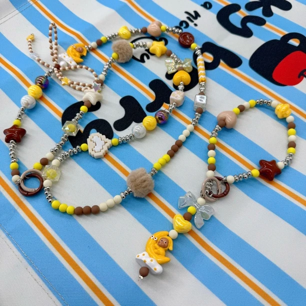 新款星星手机链创意饰品水晶彩色串珠亚克力链手斜挎