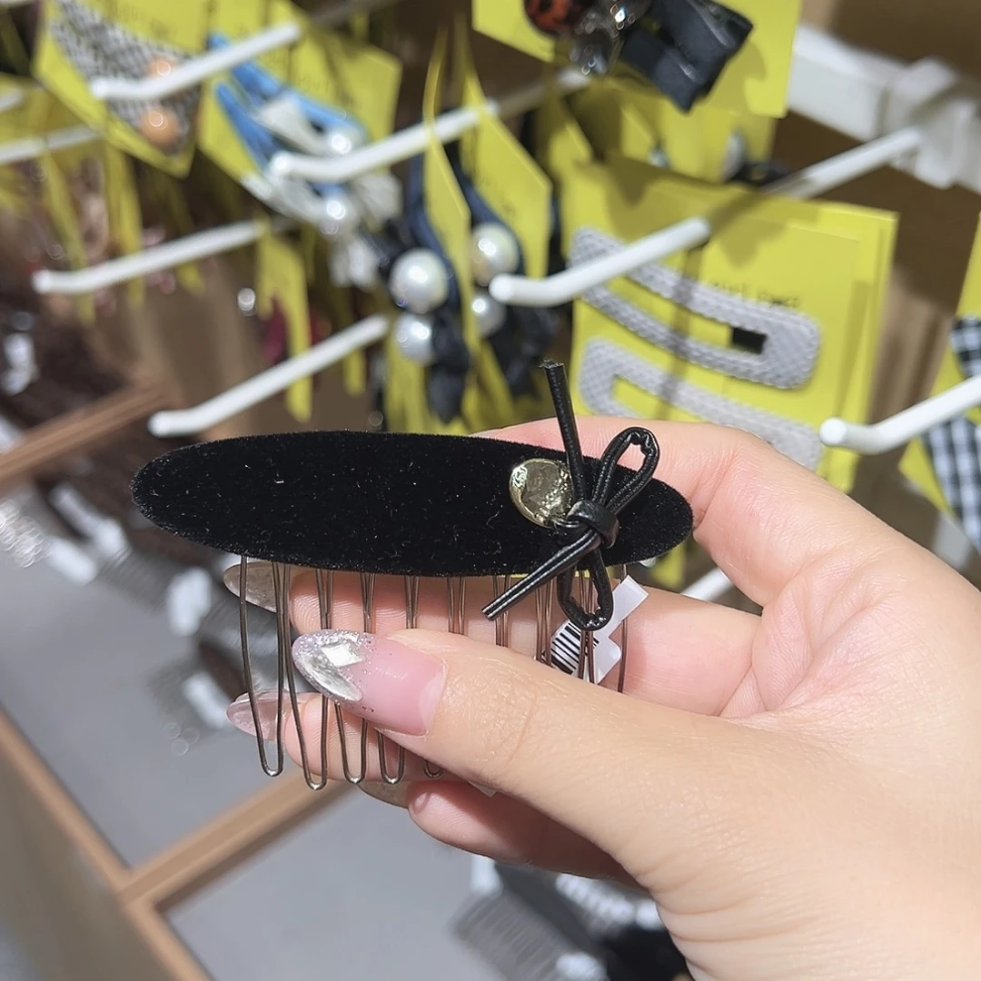 皮质铁合金黑色插梳