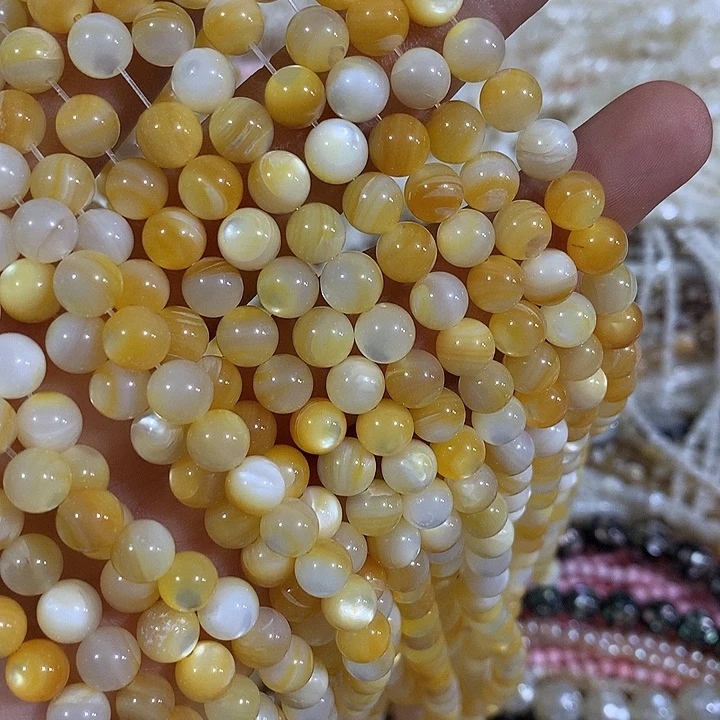 一条7mm黄金贝圆珠