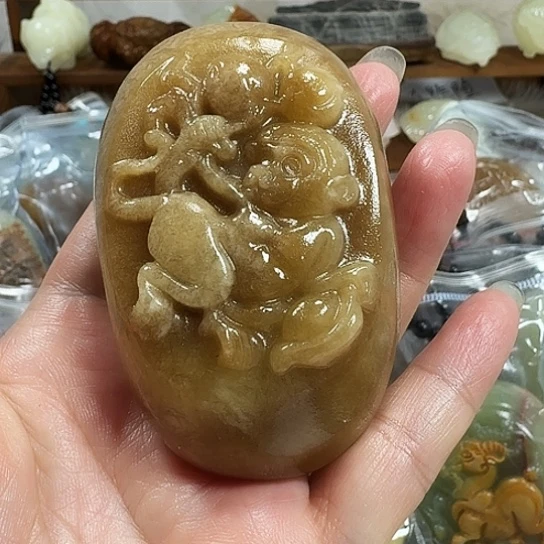 野***子砖雕石头手把件石头手把件